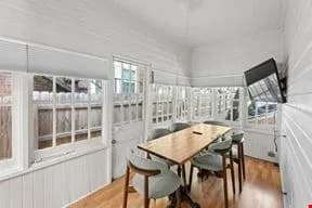 Small meeting room with a table and natural light