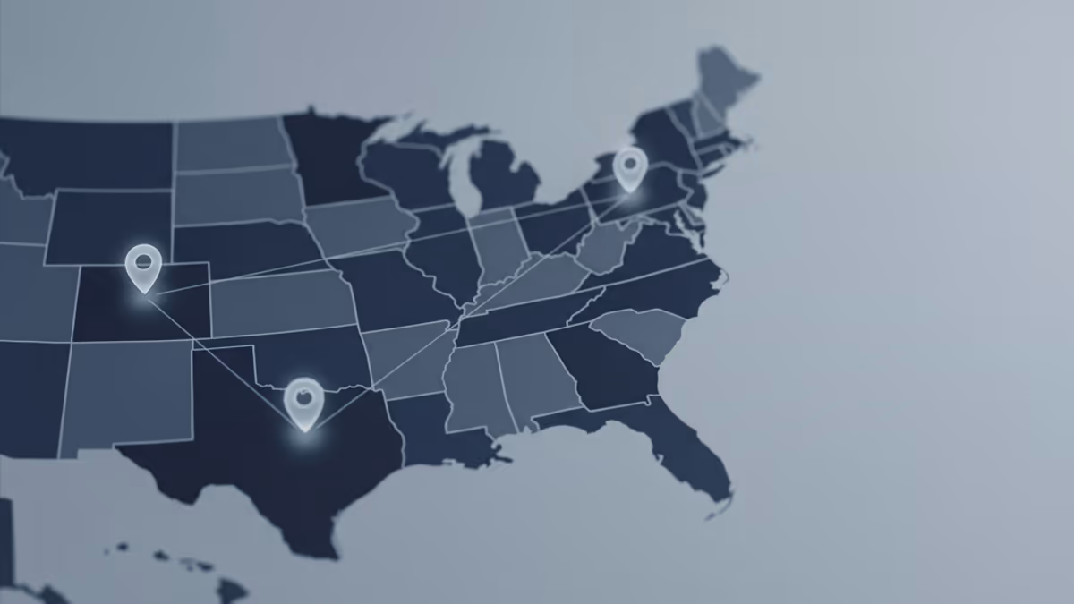 An abstract map of the United States with three location markers representing the formation state, operating state, and business address state for an LLC