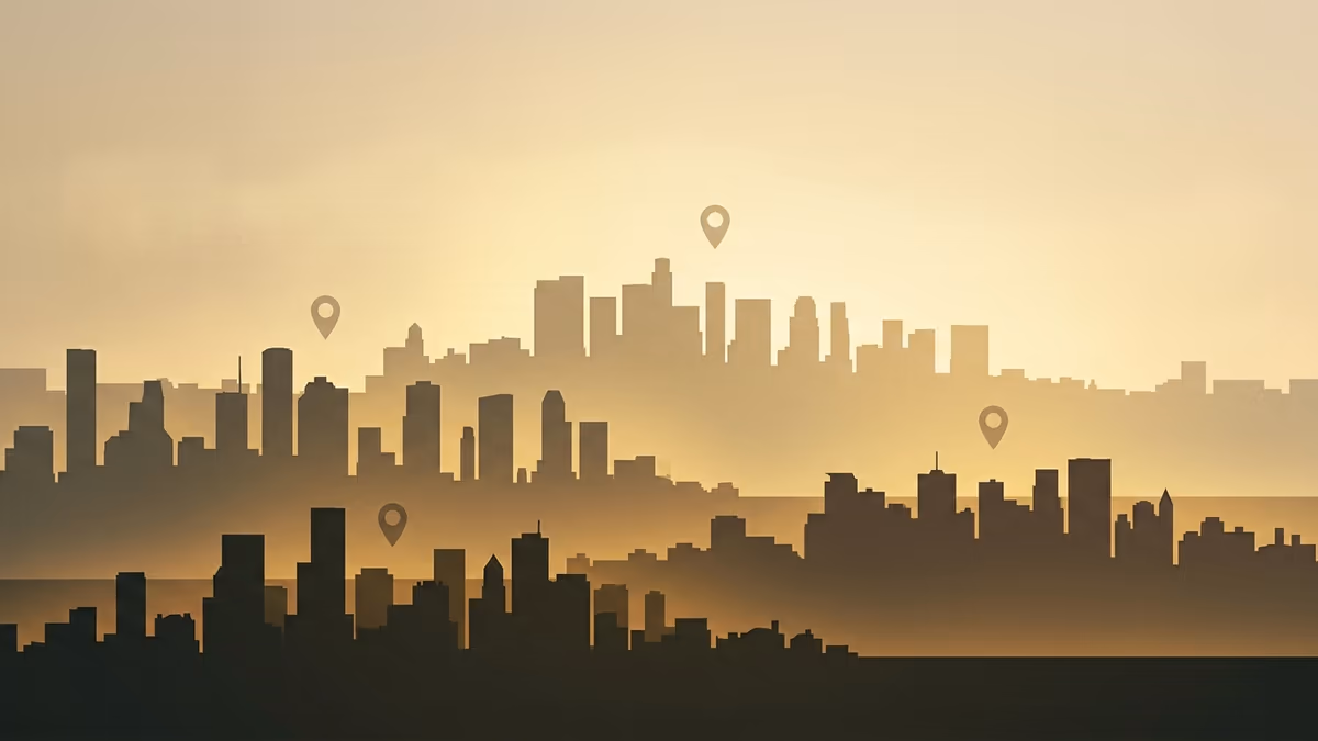 Several US city skylines at dusk symbolizing choosing the right city for an LLC virtual office
