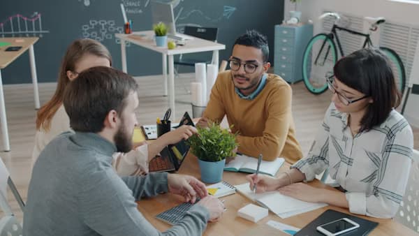 Startup team meeting in a modern conference room